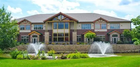 Office building with landscaping and fountains